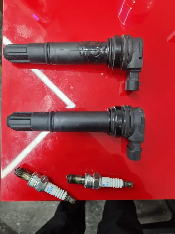Bobinas de alta derretidas y bujías desgastadas